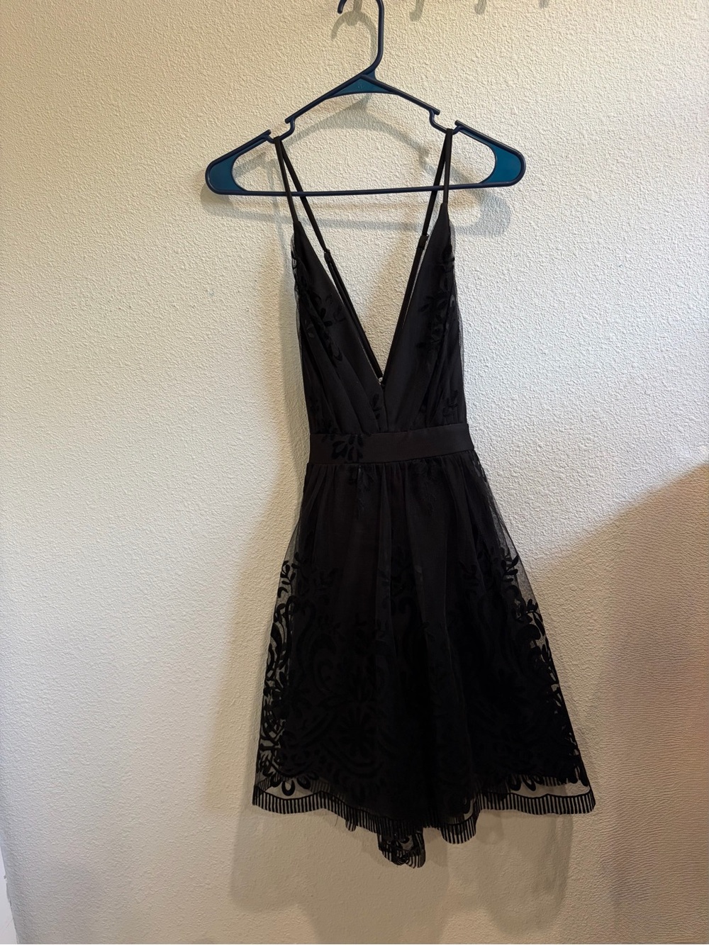 Black V-Neck Mini Dress with Delicate Lace Accents